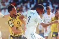 Kylian Mbappe dibayangi  Ramy Bensebaini dalam pertandingan perempat final Piala Dunia Klub 2025 antara Real Madrid vs Borussia Dortmund | Fhoto|cut|Google