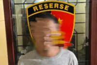 Tersangka JA (35) pelaku dugaan kasus pembobol rumah kontrakan di Kutelintang, Jumat (23/1/2026)