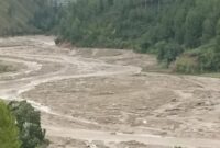Areal persawahan warga yang kini telah berubah jadi aliran sungai, Selasa (3/3/2026)