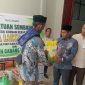 Pimpinan Bank Aceh Syariah Cabang Gayo Lues, Mahara Miko, Serahkan Bantuan Kemanusiaan Kepada Korban Bencana Kebakaran di Kampung Lukup Baru Kecamatan Rikit Gaib, Jumat (28/8).