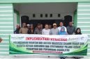 Kepala Bidang Perkebunan pada Dinas Pertanian, Ridwan SP, Fhoto bersama dengan kelompok tani pada saat pelaksanaan kegiatan dan inklusi keuangan secara masif dan merata kepada konsumen dan masyarakat pelaku UMKM, Perempuan dan penyandang disabilitas |doc|Rdn| 